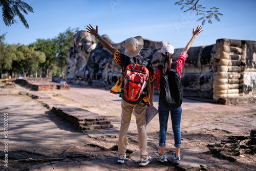 Traveler tourist man and women with backpack walking in historical place temple Ayuttaya Thailand 66-Edit