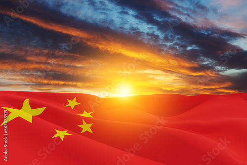 Close up waving flag of China on background of sunset sky. Flag symbols of China. National day of the people's republic of China. 1st October.