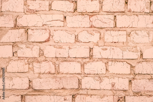 Old brick wall in warm color as background.