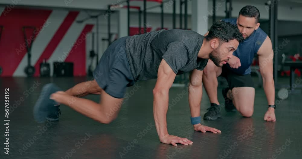 Personal trainer, fitness and coaching with people in gym for sports, workout and cardio performance. Learning, help and motivation with men training on ground for health, exercise and wellness