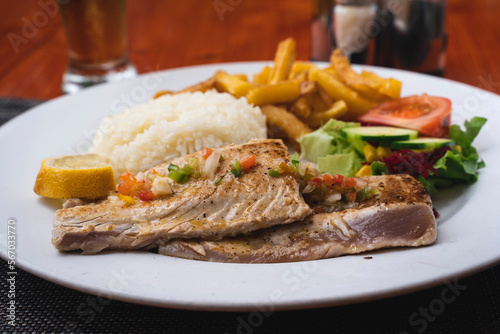 tuna steak with chips and rice