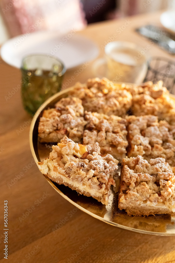 Apple Pie Pastry with a crumble crust in a rustical modern living room. Apple Pie Pastry with a crumble crust in a rustical modern living room.