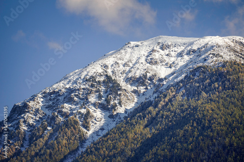 Beautiful view of the snow-capped mountain against the blue sky © Gerard