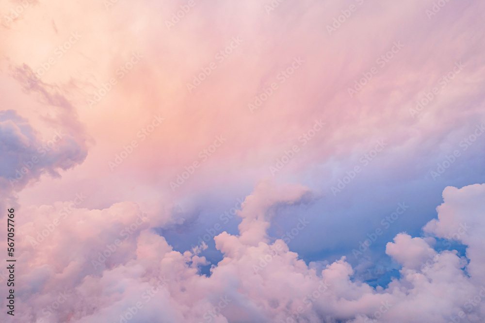 Amazing panoramic view of the sunset sky, painted with blue, purple, pink colors. Drone shot top view.