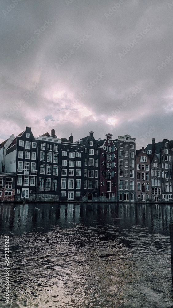 houses on the river in amsterdam