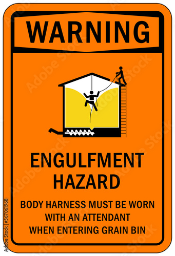 Safety harness, belt and lifeline sign and labels engulfment hazard body harness must be worn with attendant when entering grain bin, grain silo photo