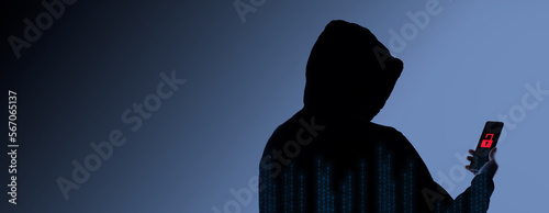Hacker Anonymous and face mask with smartphone in hand. Man in black hood shirt holding and using mobile phone on white background. Represent cyber crime data hacking or stealing personal data concept