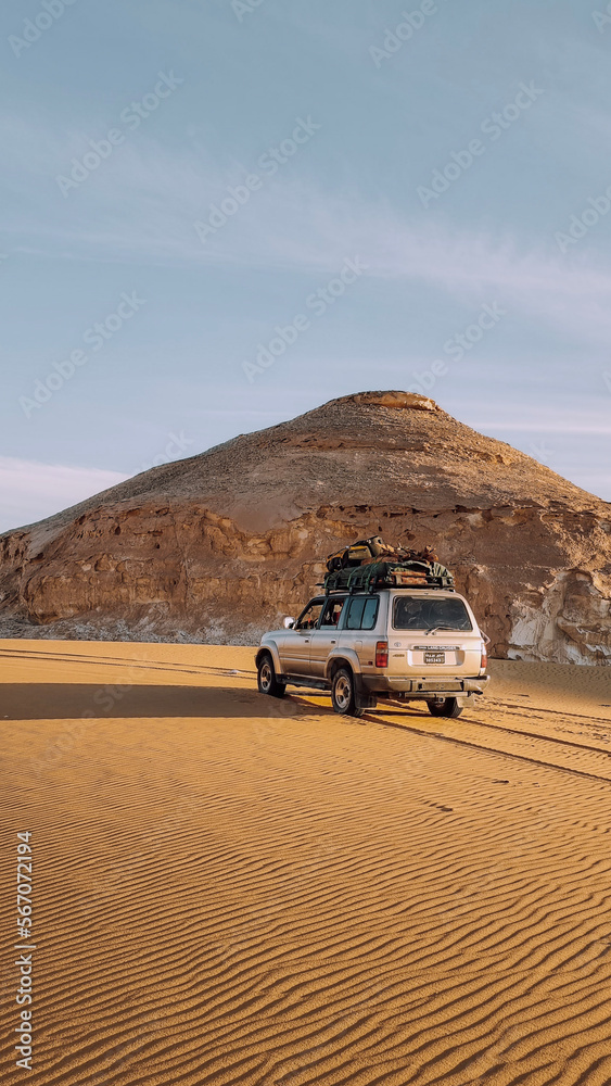 car in the white desert in egypt