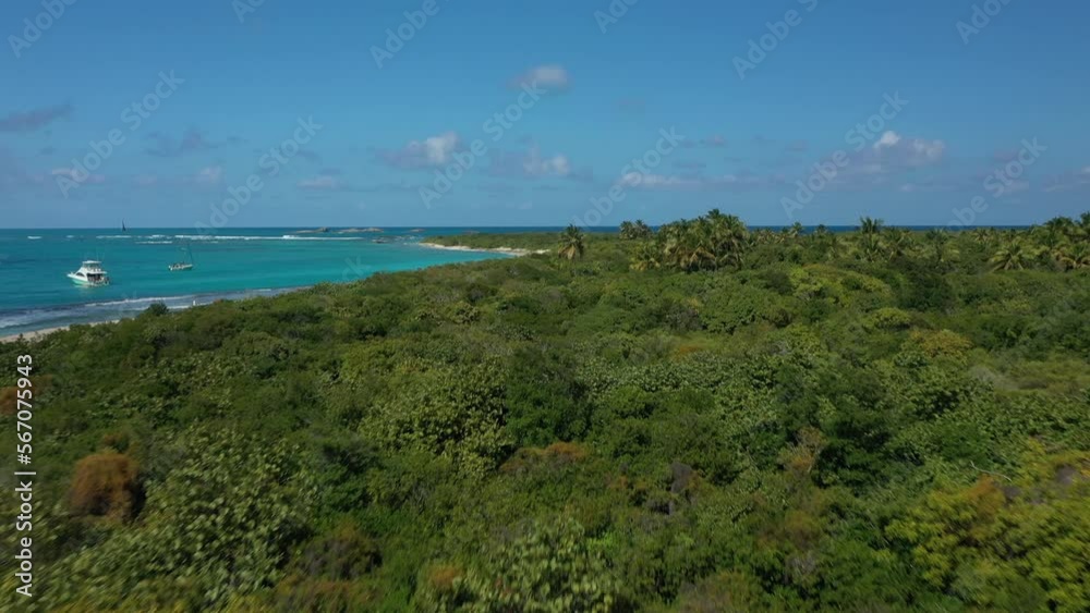 Aerial Drone view flying over trees, beach and turquoise water on a caribbean island. At Cayo Icacos Puerto Rico Aerial Drone view flying over trees, beach and turquoise water on a caribbean island. At Cayo Icacos Puerto Rico