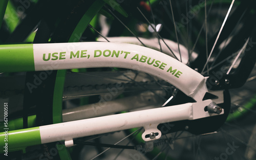 "Use me, Don't abuse me" - Caption on the body of a rental bicycle