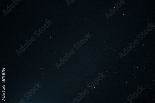 Starry space background in the night. Space stars texture. Colorful stars in the night sky