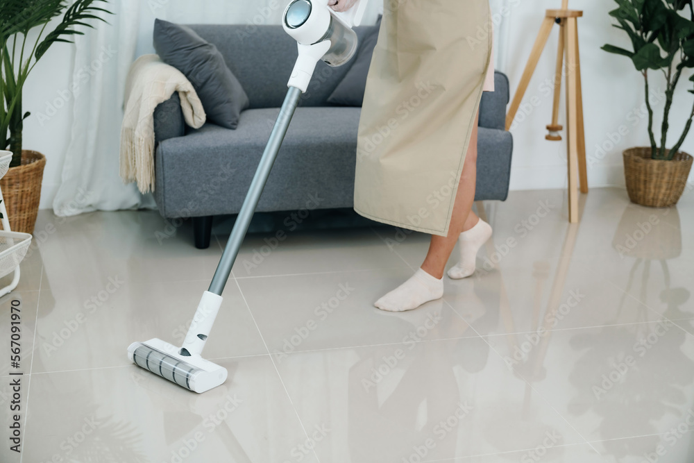Happy Asian woman house wife making perfect preparing to clean home Happy Asian woman house wife making perfect preparing to clean home