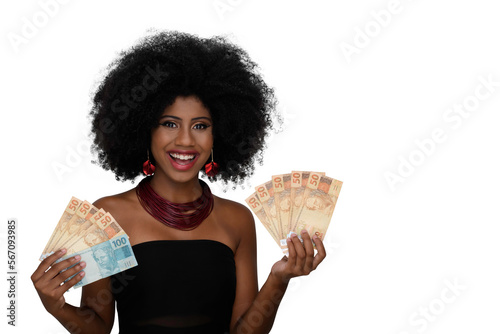 woman holding money, young smiling woman holding Brazilian money	 photo