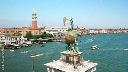 Venice drone 4k. Punta della Dogana, Fortuna Statue. Iconic symbol of Venice, Italy. Famous landmark. Romantic honeymoon, cruise ship destination in Europe. 