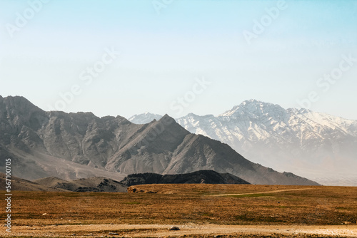 Photography Afghanistan landscape, desert plain against the backdrop of mountains