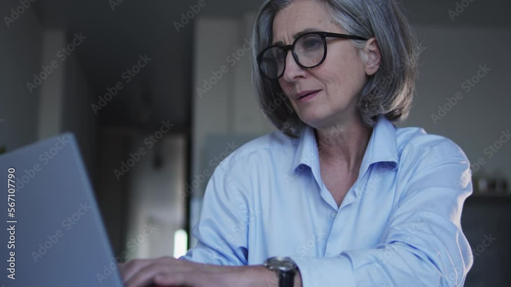 Female programmer typing on laptop, writing scripts and developing programs Female programmer typing on laptop, writing scripts and developing programs