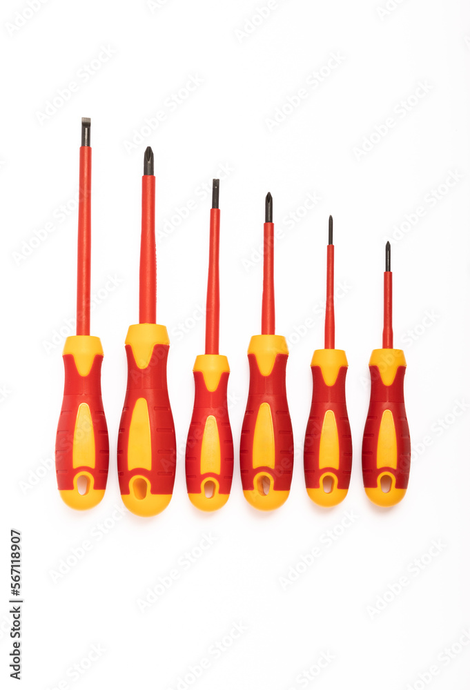 Red screwdriver isolated on white background. Tool. Red screwdriver isolated on white background. Tool.