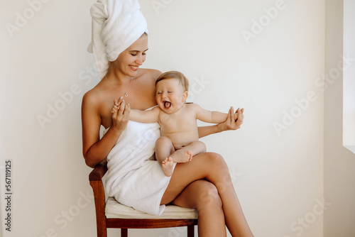 mother and baby after bath