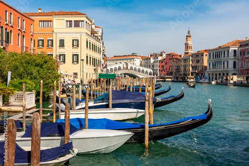 Gondolas on Grand canal with Rialto bridge at background, Venice, Italy