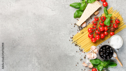 Traditional italian food ingredients on stone background. Top view, panoramic, free space for text.
