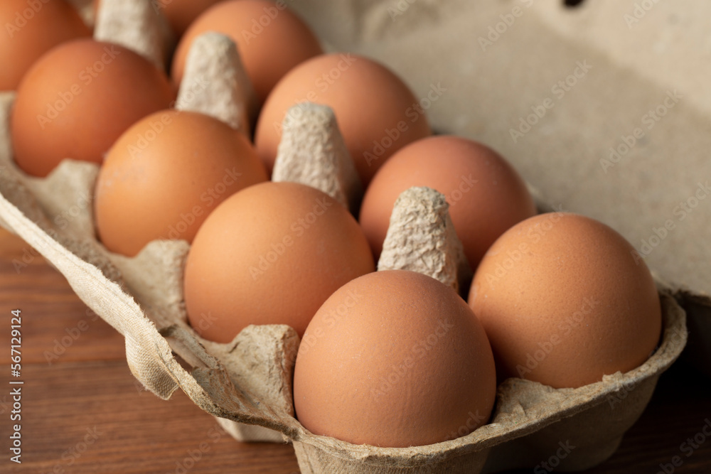 Brown eggs on a dark background.Sale of eggs.Fresh eggs. Brown eggs on a dark background.Sale of eggs.Fresh eggs.