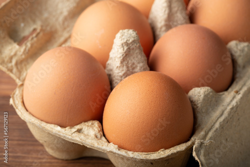 Brown eggs on a dark background.Sale of eggs.Fresh eggs.