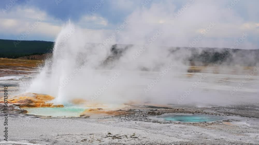 Beautiful view of hot spring pool geothermal landscape. Geyser basin and forest. Famous tourist attraction at Yellowstone national park. Hot thermal spring Black Pool in Yellowstone National Park Beautiful view of hot spring pool geothermal landscape. Geyser basin and forest. Famous tourist attraction at Yellowstone national park. Hot thermal spring Black Pool in Yellowstone National Park