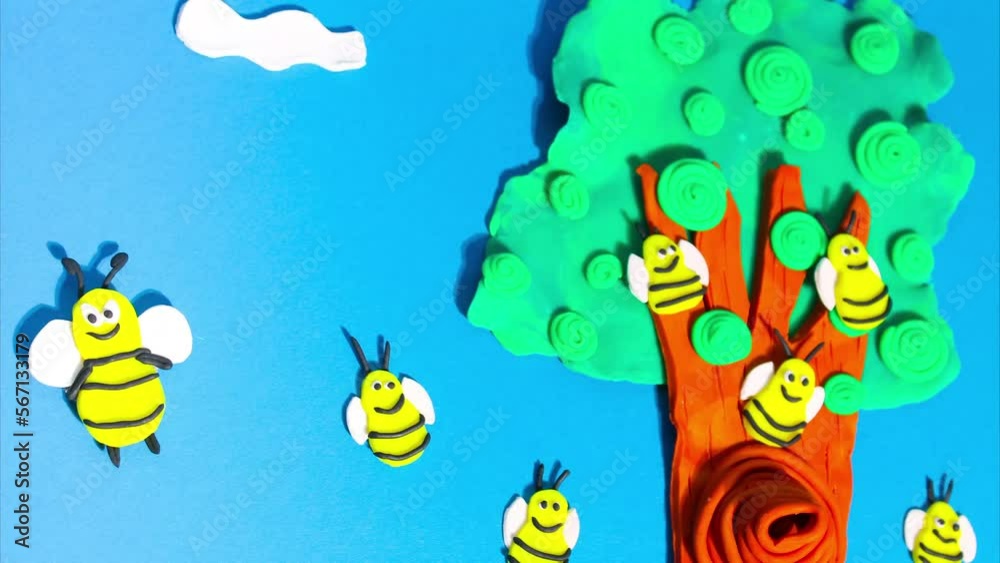 Stop motion animation from plasticine. Bees fly near a beehive on a tree in the forest. Claymotion cartoon. Stop motion animation from plasticine. Bees fly near a beehive on a tree in the forest. Claymotion cartoon.