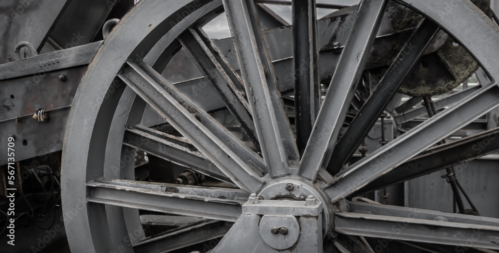 An old steel wheel of a pit cage in a disused coal mine
