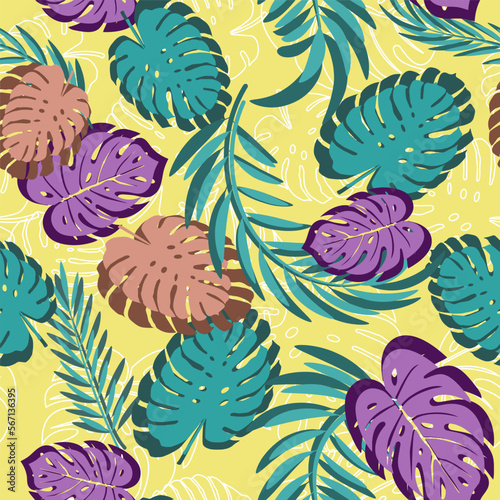 Seamless pattern of large leaves of monstera and palms.