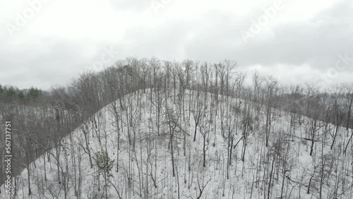 Snowy drone shot over a mountain