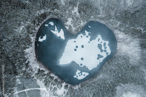 Wallpaper Mural Aerial image of a heart shaped frozen lake surrounded by snow covered forest, Torontodigital.ca