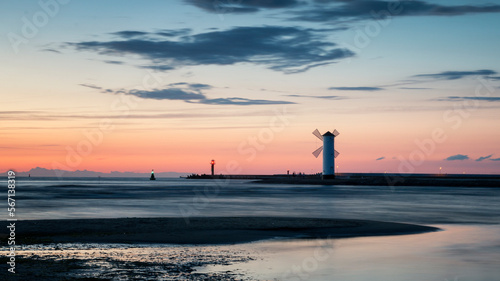 Sunset at the lighthouse in Swinoujscie, Poland.
