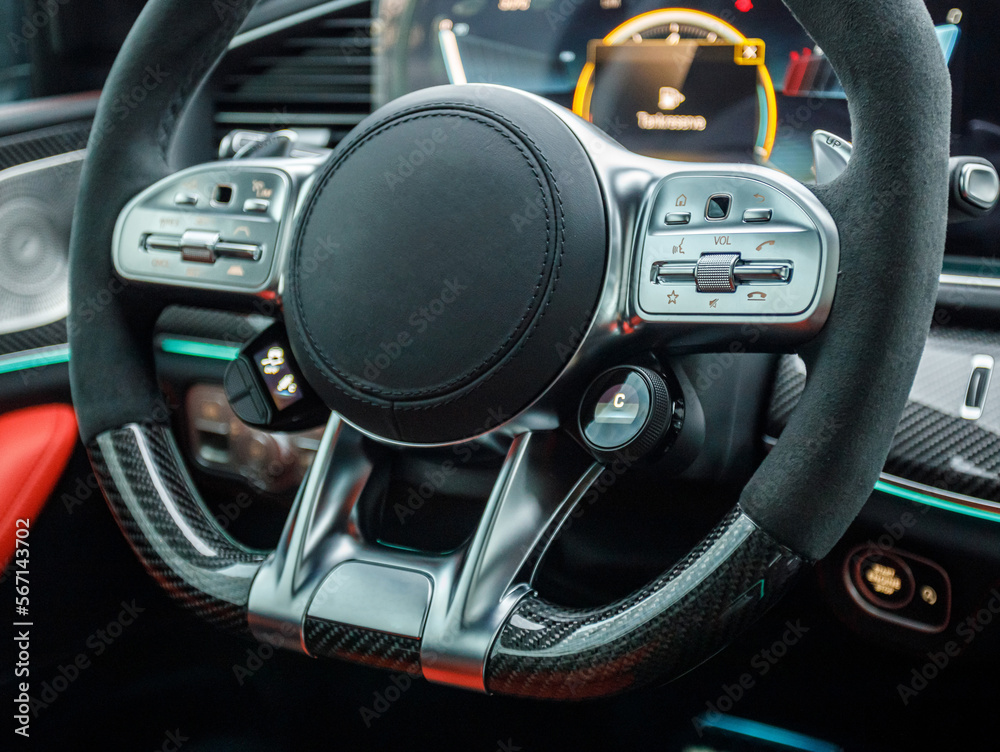 stylish sports steering wheel with alcantara in a premium fast car