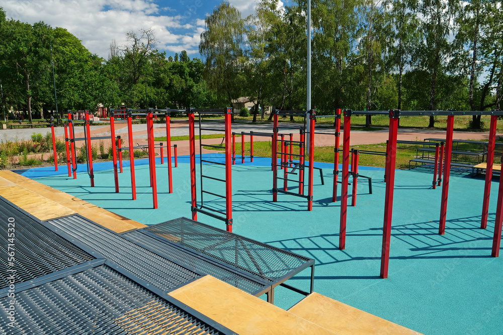 Sports ground with horizontal bars and other new exercise equipment