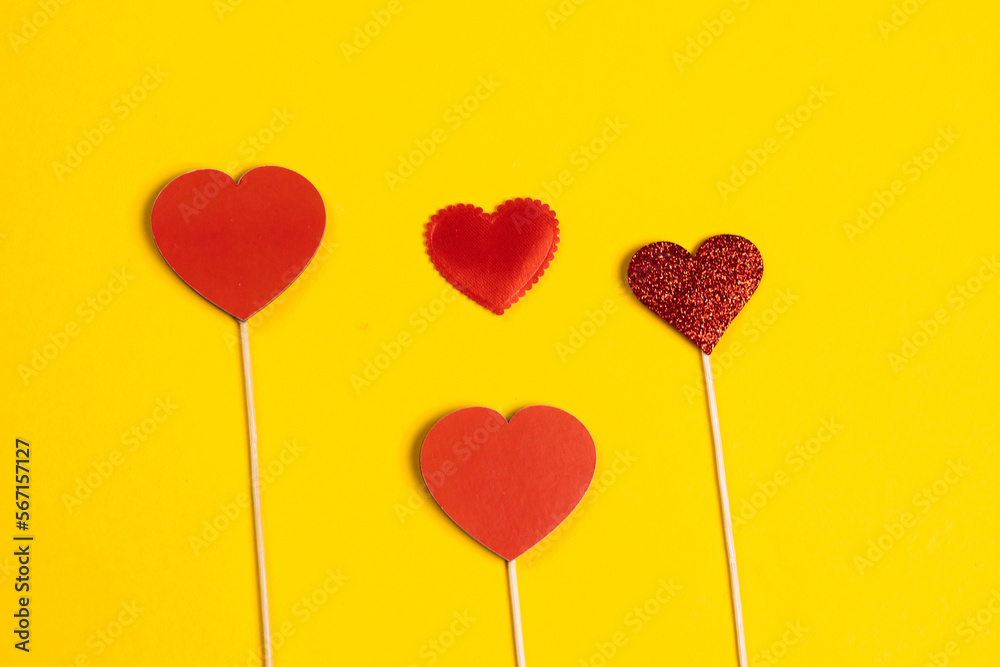 Happy Valentine's day. 14 February. Love. Red heart on a yellow background. Copy space.