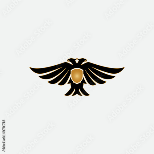 Vector illustration of two birds and a shield for an icon, symbol or logo. eagle or phoenix flat logo