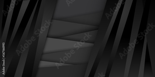 Abstract background in black and gray colors with several overlapping surfaces with shadows