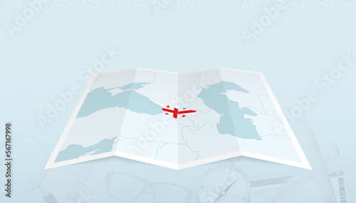Map of Georgia with the flag of Georgia in the contour of the map on a trip abstract backdrop.