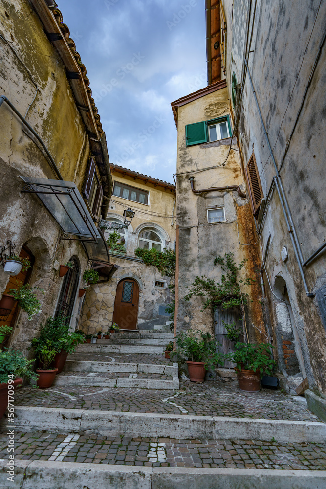 Fototapeta premium An old atmospheric city with narrow and cramped quiet streets and stairs