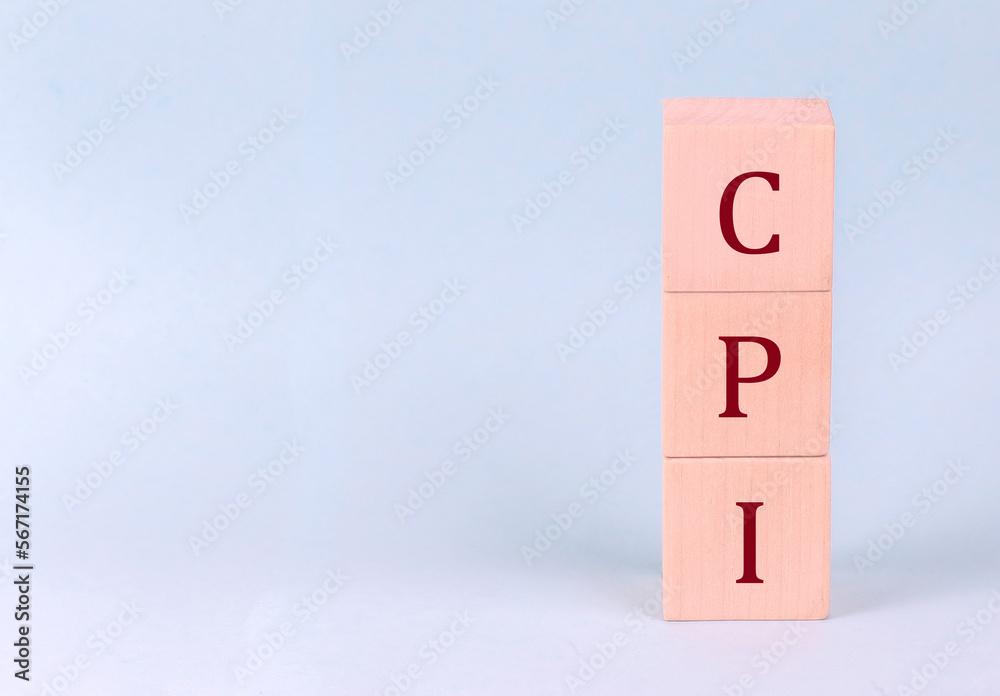 CPI on wooden cubes on a blue background CPI on wooden cubes on a blue background