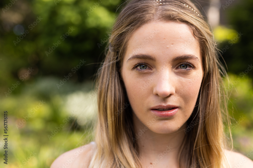 Portrait of caucasian bride with green eyes in garden at outdoor wedding, with copy space Portrait of caucasian bride with green eyes in garden at outdoor wedding, with copy space