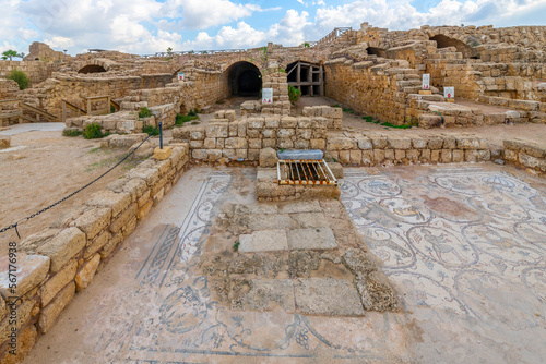 Original Roman mosaics at the ancient archaeological Caesarea National Park and and historic port on the Mediterranean coast of Caesarea, Israel. photo