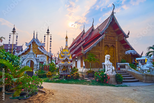 The shrines of Wat Mahawan at sunset, Chiang Mai, Thailand photo