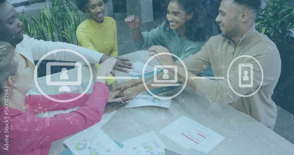 Animation of icons and data processing over diverse business people stacking hands in office