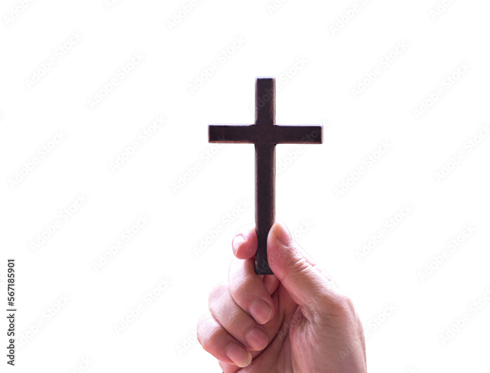 Hand holding a crucifix cross, isolated.