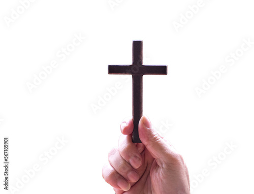 Hand holding a crucifix cross, isolated.