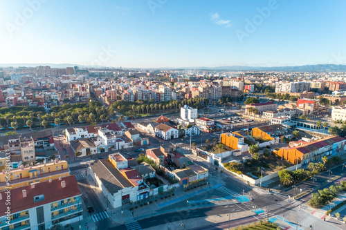 Aerial view of houses by the promenade and beach of Valencia
