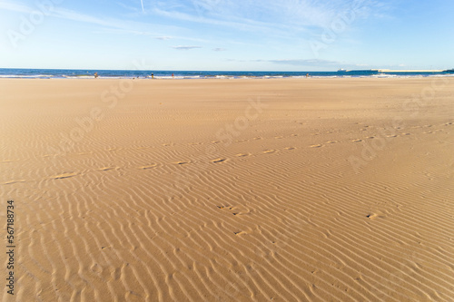 footprints on the sand on the beach of Valencia