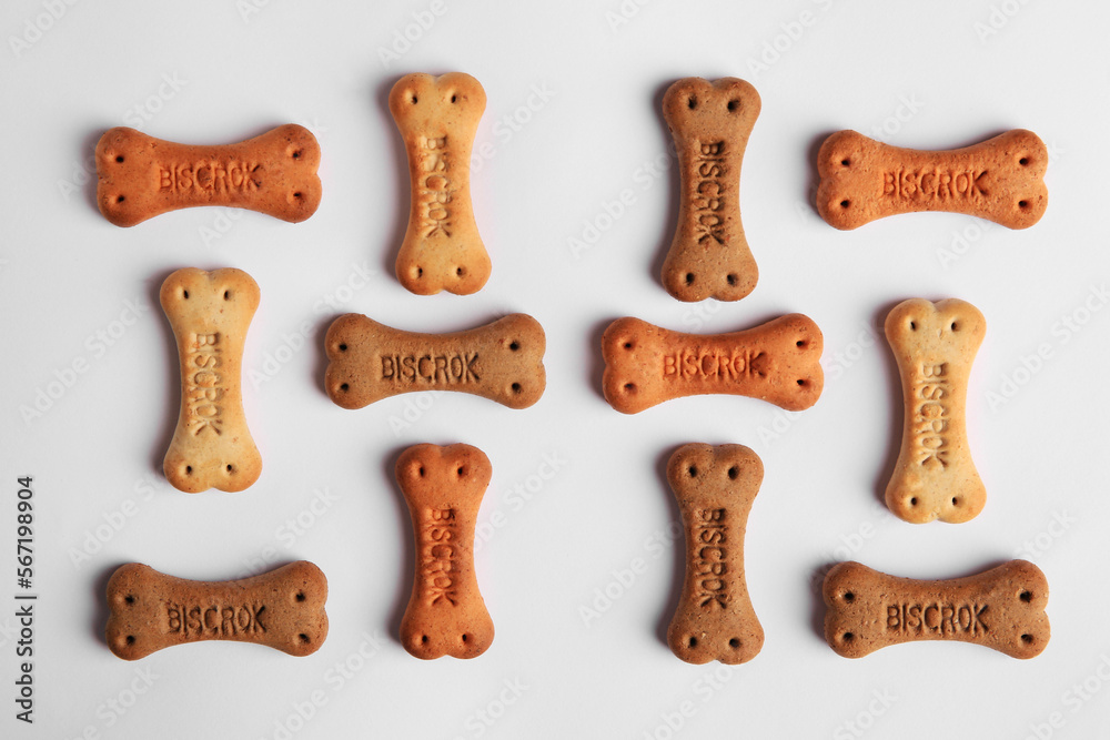 Bone shaped dog cookies on white background, top view